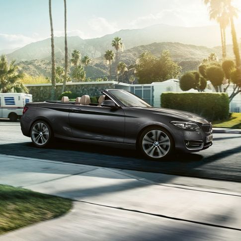 BMW 2 Series Convertible, driving shot from the side BMW 2 Series Convertible, driving shot from the side