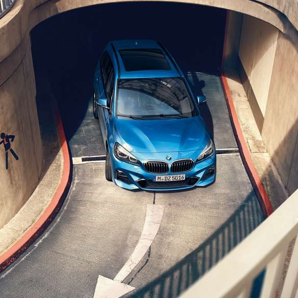 BMW 2 Series Gran Tourer driving in multi-storey car park BMW 2 Series Gran Tourer F46 Facelift 2018 Misano Blue metallic bird’s-eye view driving in multi-storey car park