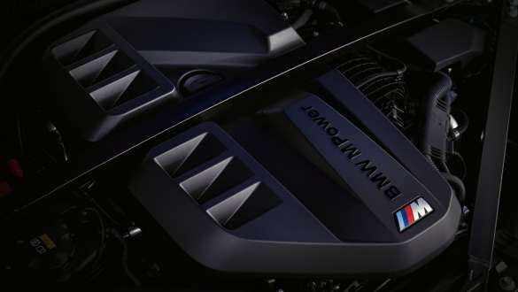 High-performance BMW M TwinPower Turbo inline 6-cylinder petrol engine BMW M4 Competition Convertible with M xDrive G83 2021 BMW M4 Competition Convertible with M xDrive G83 2021 high-performance BMW M TwinPower Turbo inline 6-cylinder petrol engine close-up engine cover