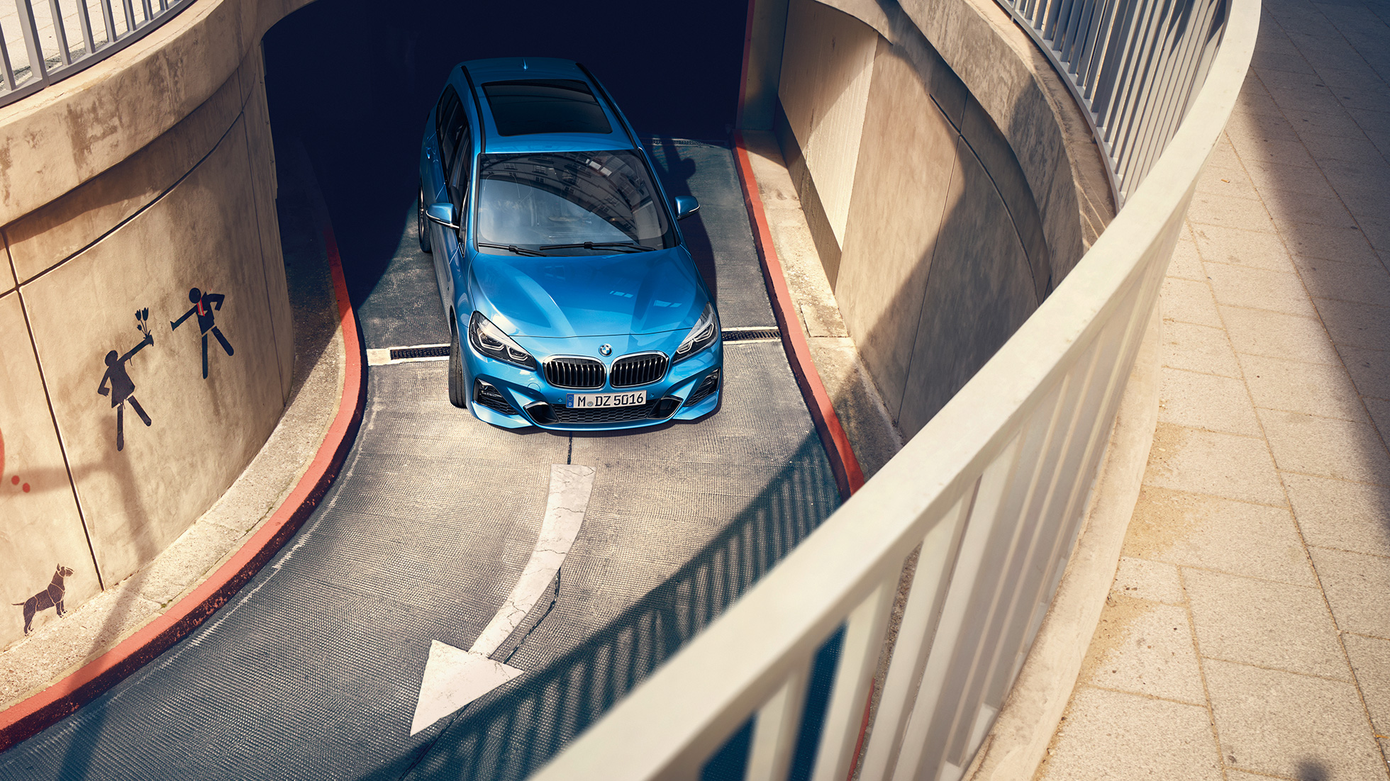 BMW 2 Series Gran Tourer driving in multi-storey car park BMW 2 Series Gran Tourer F46 Facelift 2018 Misano Blue metallic bird’s-eye view driving in multi-storey car park