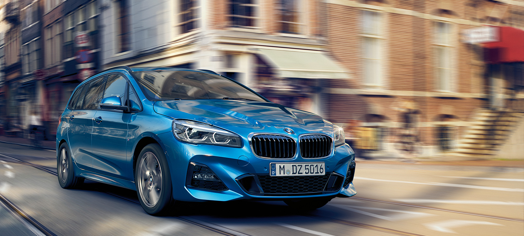 BMW 2 Series Gran Tourer driving on the road BMW 2 Series Gran Tourer F46 Facelift 2018 Misano Blue metallic three-quarter front view driving on the road