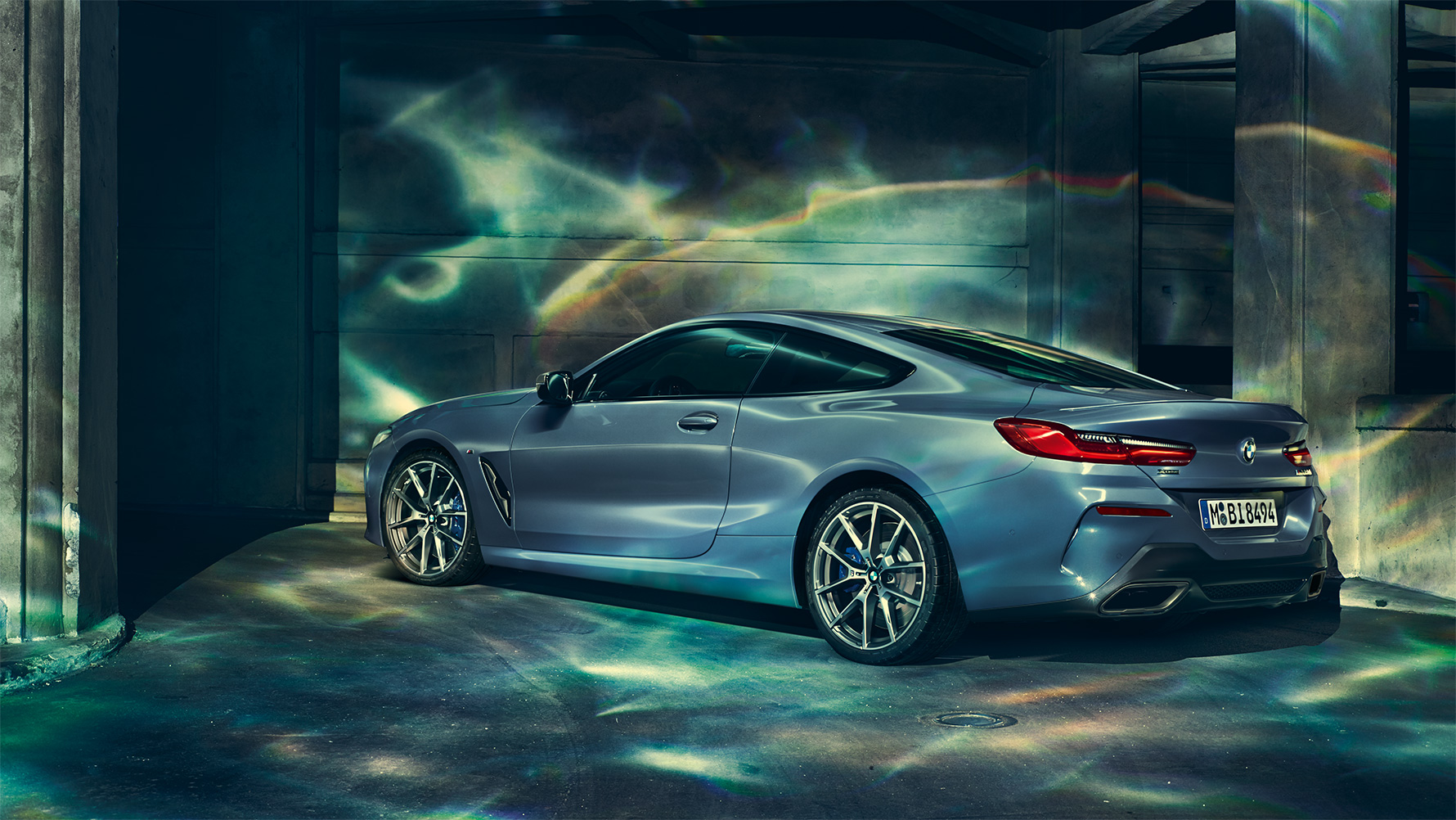 BMW 8 Series Coupé, three-quarter rear shot A three-quarter front still shot of the BMW 8 Series Coupé in an urban setting.