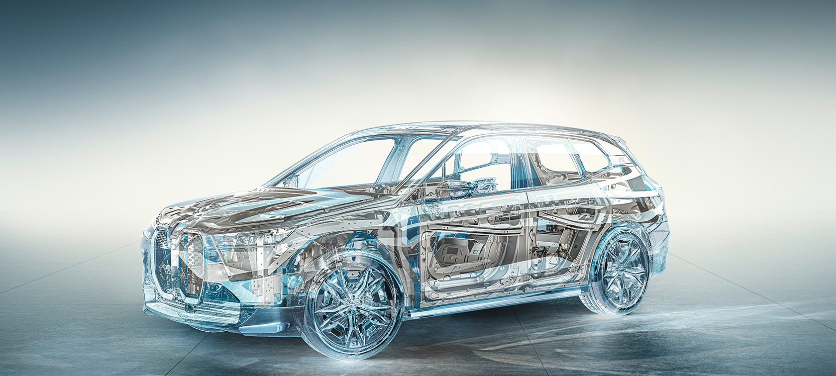 BMW iX M60 i20 2022 electric SUV electric car driving on coastal road BMW iX M60 i20 2022 electric SUV electric car BMW Individual Storm Bay metallic rear view driving on coastal road