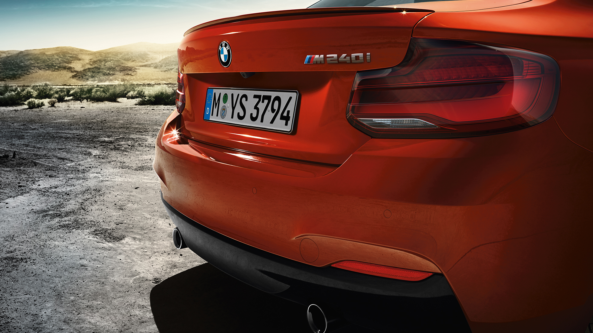 Rear design BMW M240i Coupé Rear design BMW M240i Coupé F22 2017 Sunset Orange metallic three-quarter rear view