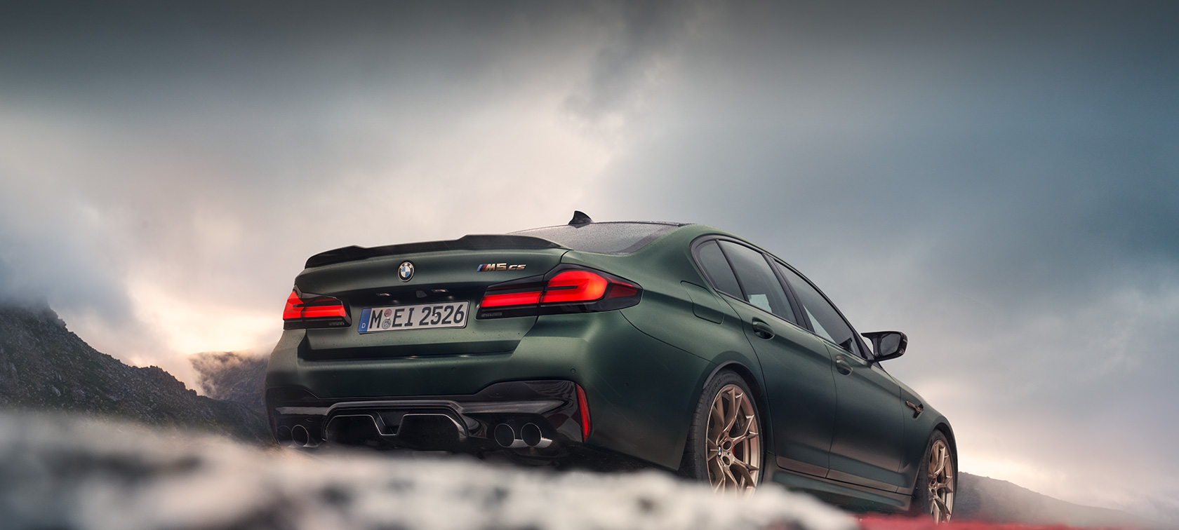 BMW M5 Competition F90 LCI Facelift 2020 side view standing BMW M5 Competition F90 LCI Facelift 2020 BMW Individual Imola Red side view standing