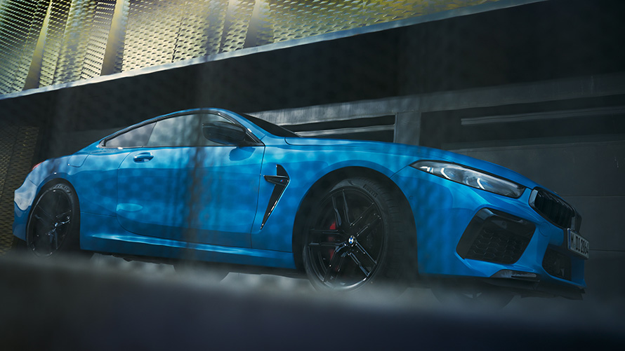 BMW M8 Competition Coupé F92 LCI Facelift 2022 Daytona Beach Blue Uni metallic three-quarter side view low-angle shot BMW M8 Competition Coupé F92 LCI Facelift 2022 Daytona Beach Blue Uni metallic three-quarter side view low-angle shot
