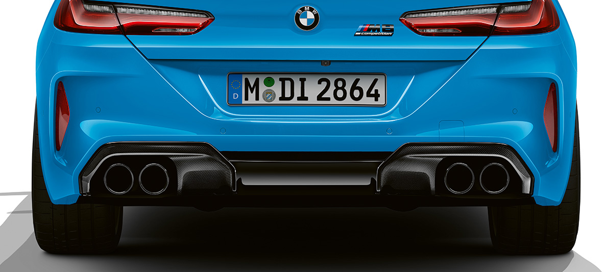Diffuser insert made of carbon fibre reinforced plastic BMW M8 Competition Coupé F92 LCI Facelift 2022 Daytona Beach Blue uni BMW M8 Competition Coupé F92 LCI Facelift 2022 Daytona Beach Blue uni M Carbon exterior package rear apron close-up diffuser insert made of carbon fibre reinforced plastic