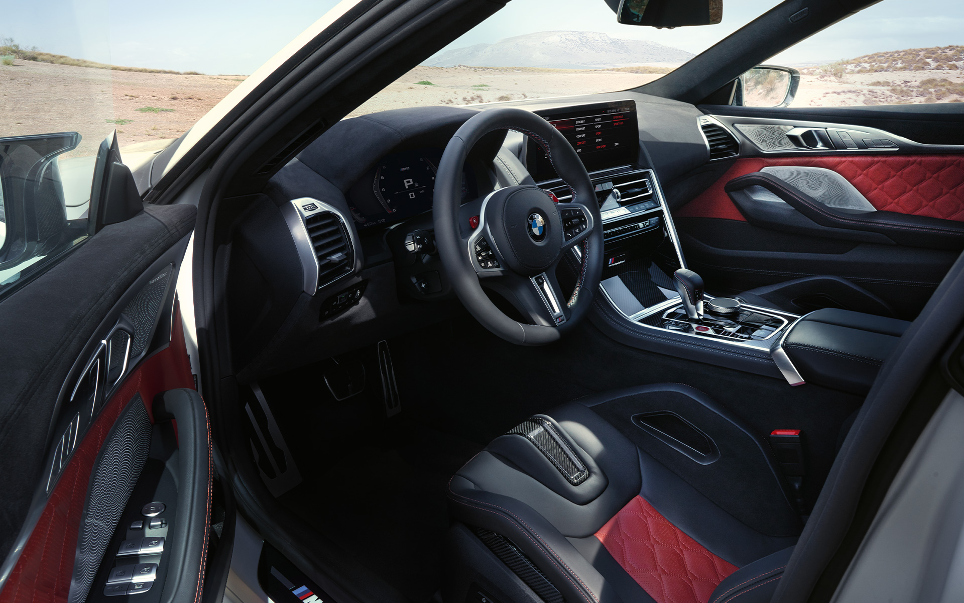Interior view BMW M8 Competition Gran Coupé F93 LCI 2022 BMW M8 Competition Gran Coupé F93 LCI Facelift 2022 interior view with open door