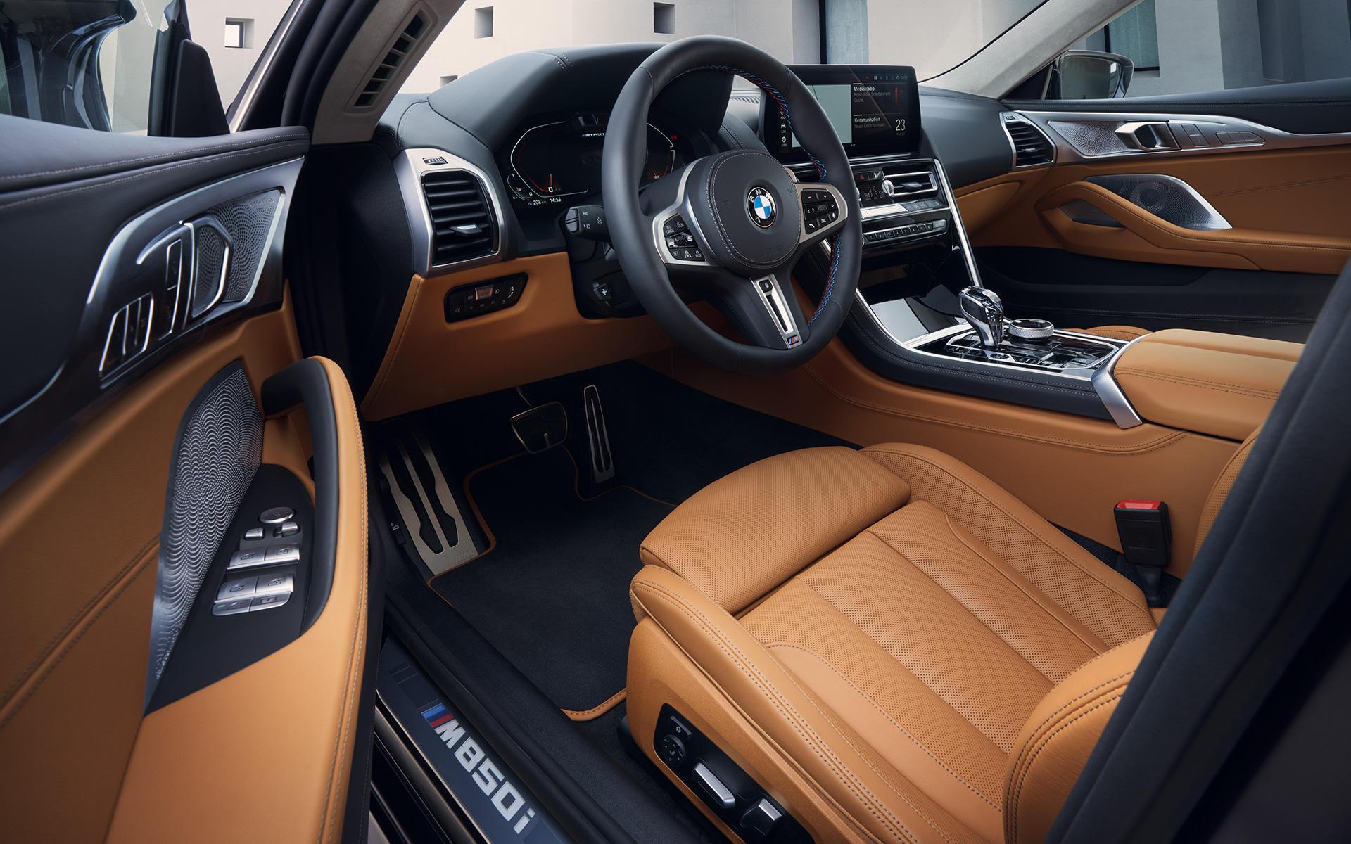 Interior cockpit BMW M850i xDrive Gran Coupé G16 LCI Facelift 2022 BMW M850i xDrive Gran Coupé G16 LCI Facelift 2022 Interior cockpit through open driver's door