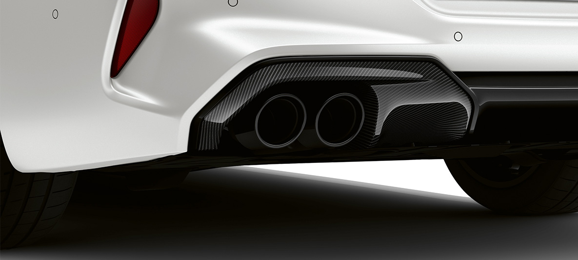 Rear apron carbon M Carbon exterior package BMW M8 Competition Gran Coupé F93 LCI Facelift 2022 BMW M8 Competition Gran Coupé F93 LCI Facelift 2022 BMW Individual Frozen Brilliant White metallic M Carbon exterior package rear apron carbon close-up