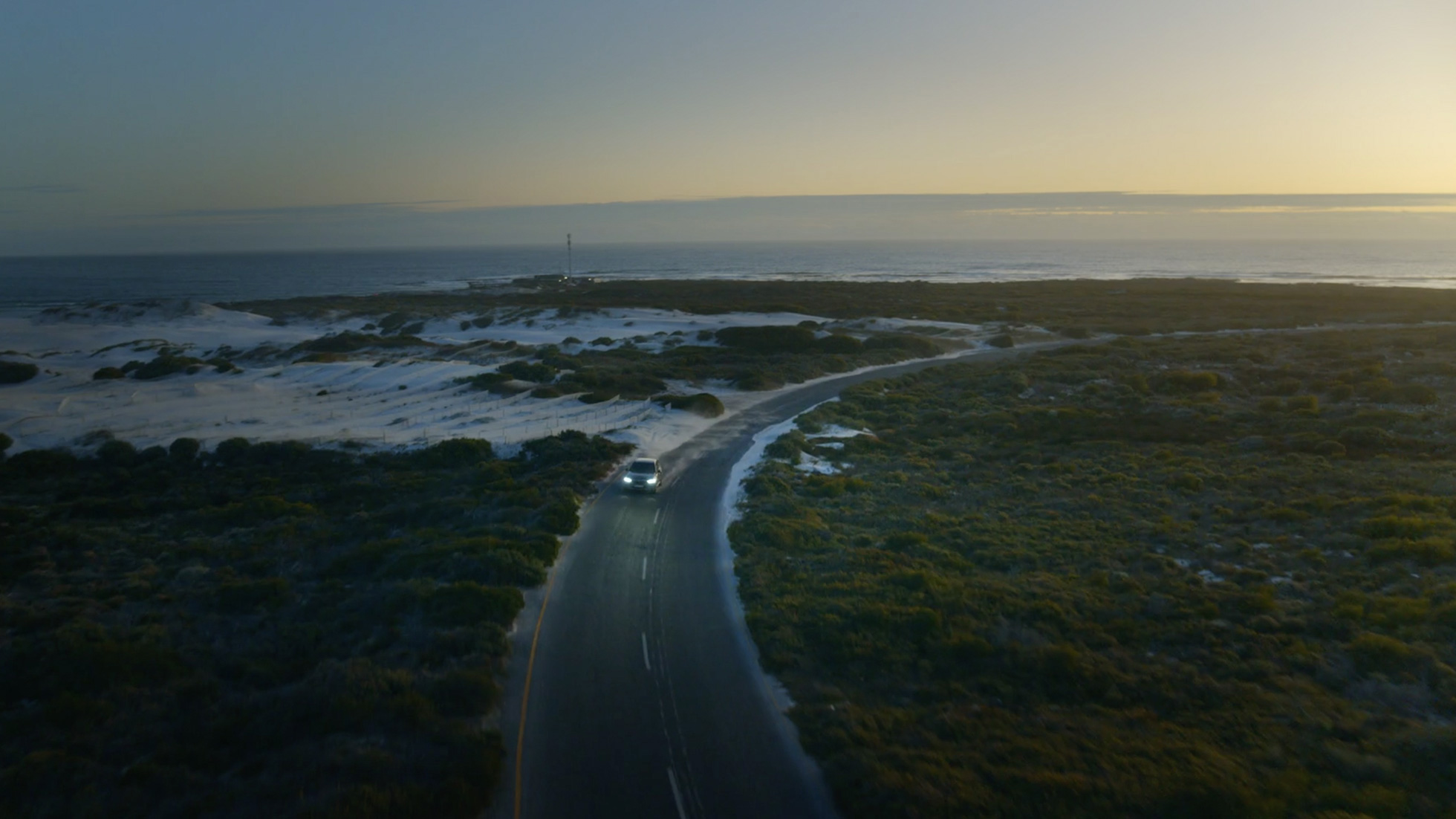 Plug-in hybrid BMW X5 xDrive45e G05 driving on the street Plug-in hybrid BMW X5 xDrive45e G05 driving on the street bird’s-eye view