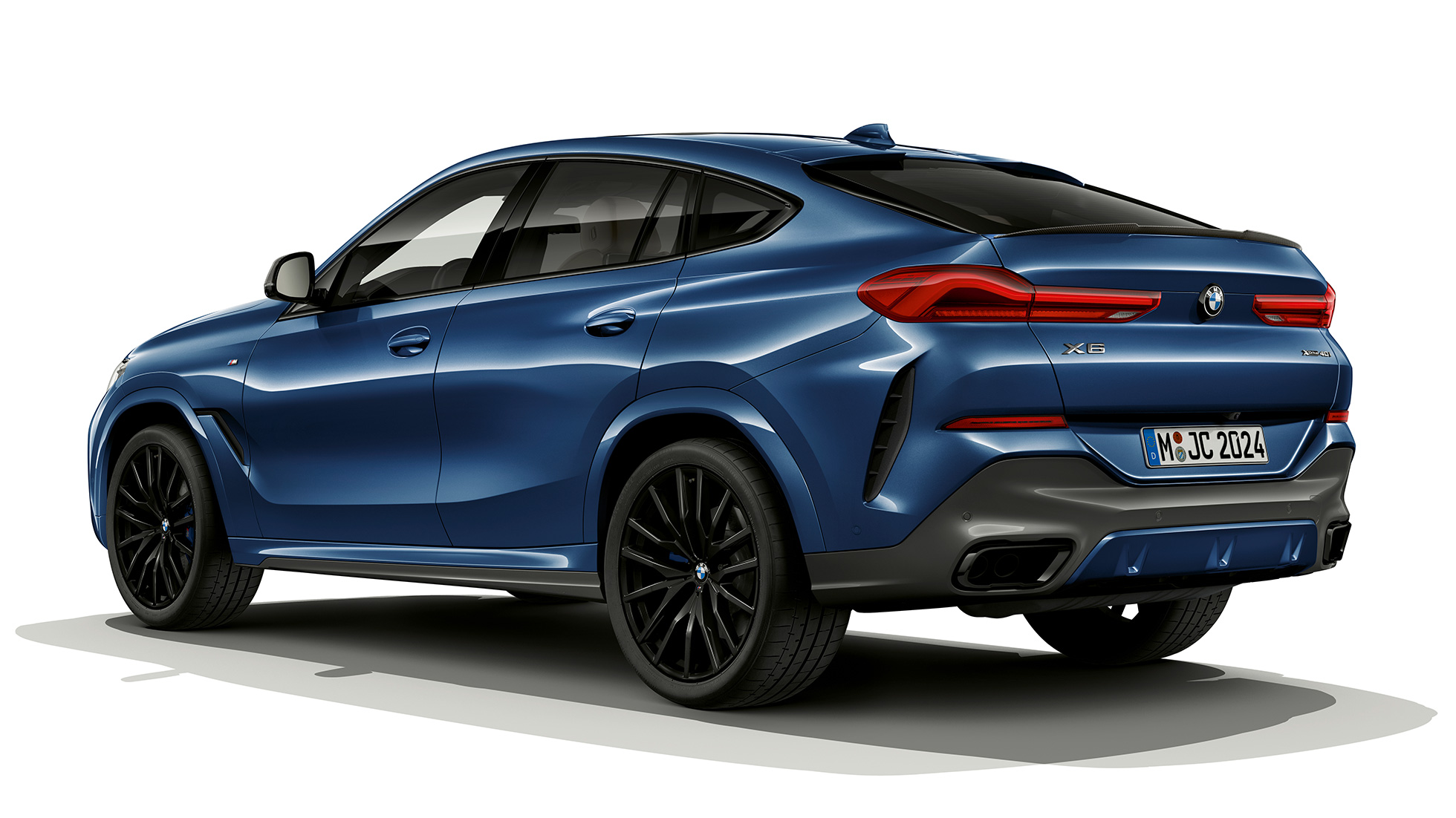 BMW X6 with M Sport package, rear. BMW X6 with M Sport package in three-quarter rear perspective.