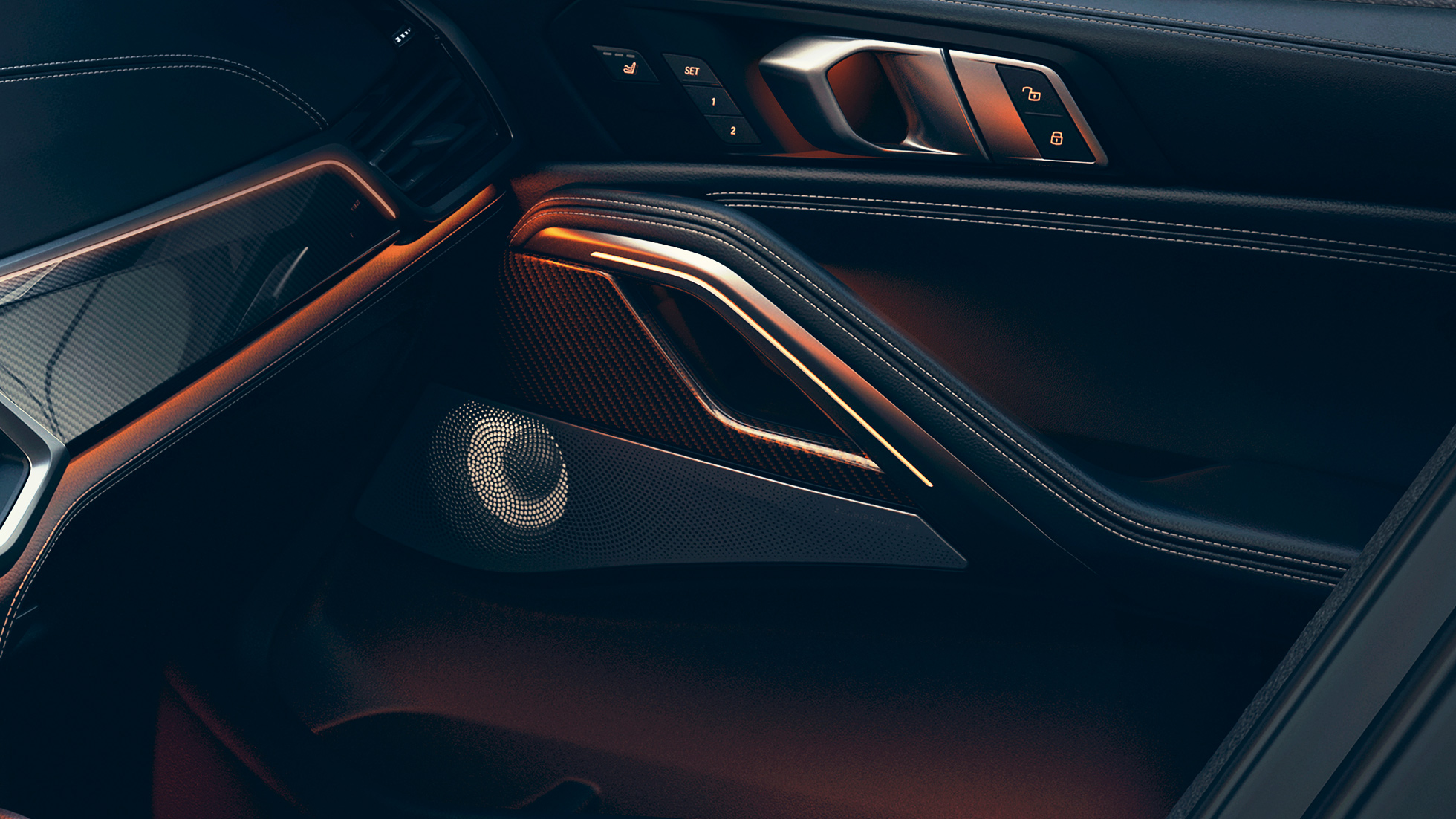 BMW X6 speaker. Close-up of the BMW interior with focus on speaker.
