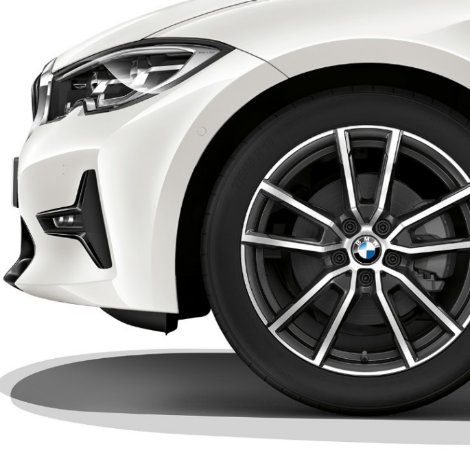 BMW 3 Series Sedan, Model Sport Line light alloy wheel. Close-up of the light alloy wheel of the BMW 3 Series Sedan with Model Sport Line equipment.