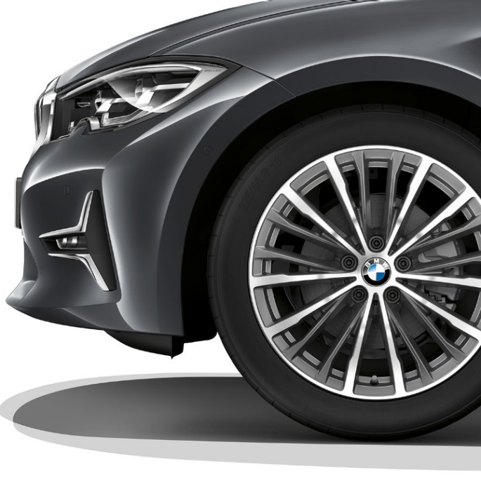 BMW 3 Series Sedan, Modell Luxury Line light alloy wheel. Close-up of the light alloy wheel of the BMW 3 Series Sedan with Model Luxury Line equipment.