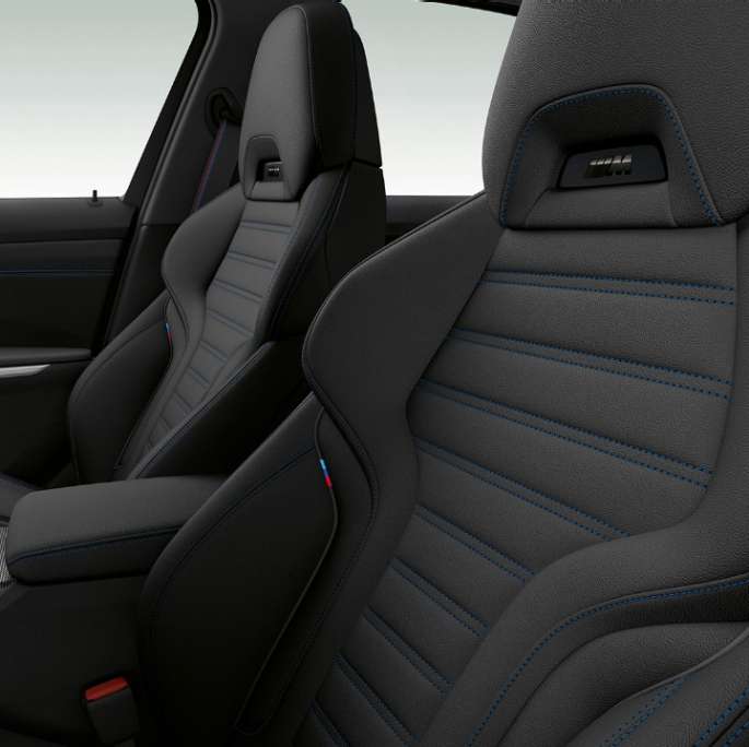 BMW 3 Series Sedan, Model M Sport front seats. Side close-up of the front seats of the BMW 3 Series Sedan with Model M Sport features.