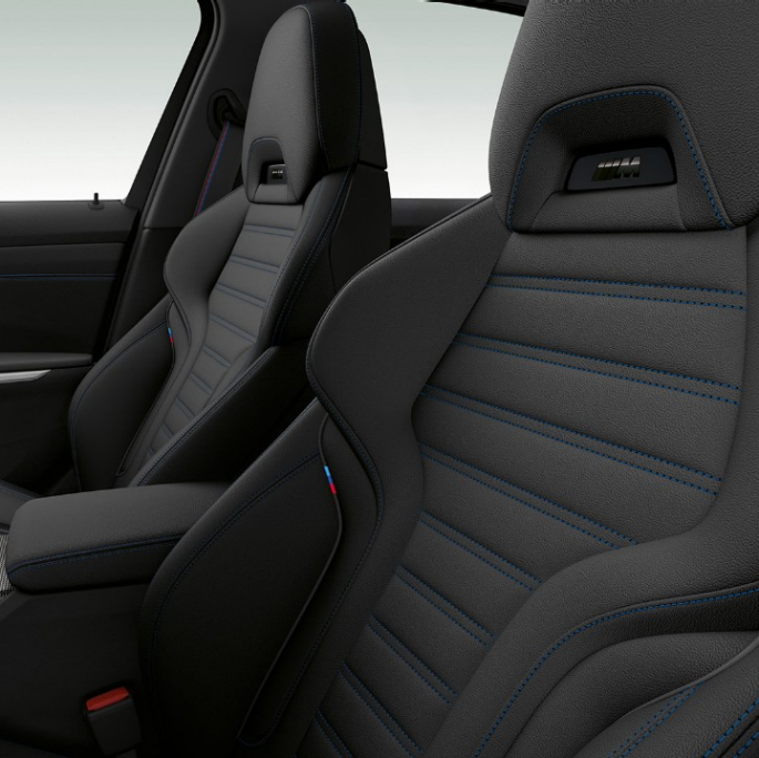 BMW 3 Series Sedan, Model M Sport front seats. Side close-up of the front seats of the BMW 3 Series Sedan with Model M Sport features.